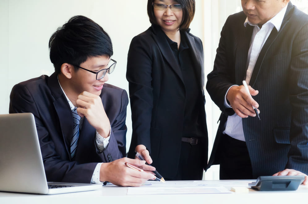Collaborative team session on corporate advisory services in Malaysia